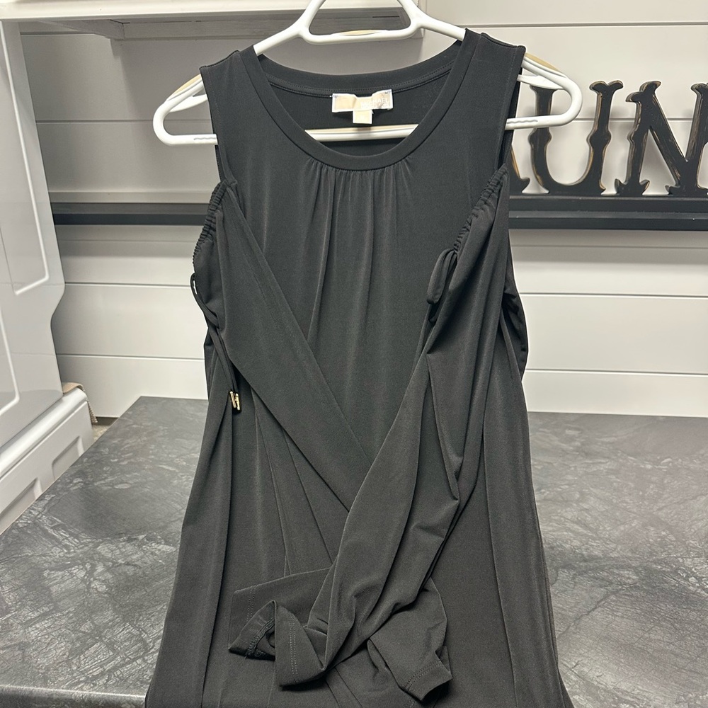 Black polyester peekaboo shoulder dress-flowy and comfortable! Like new.